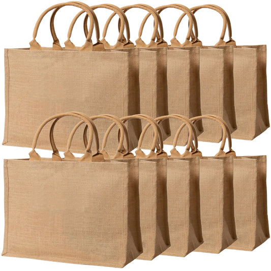 Set of brown jute bags with handles on a white background